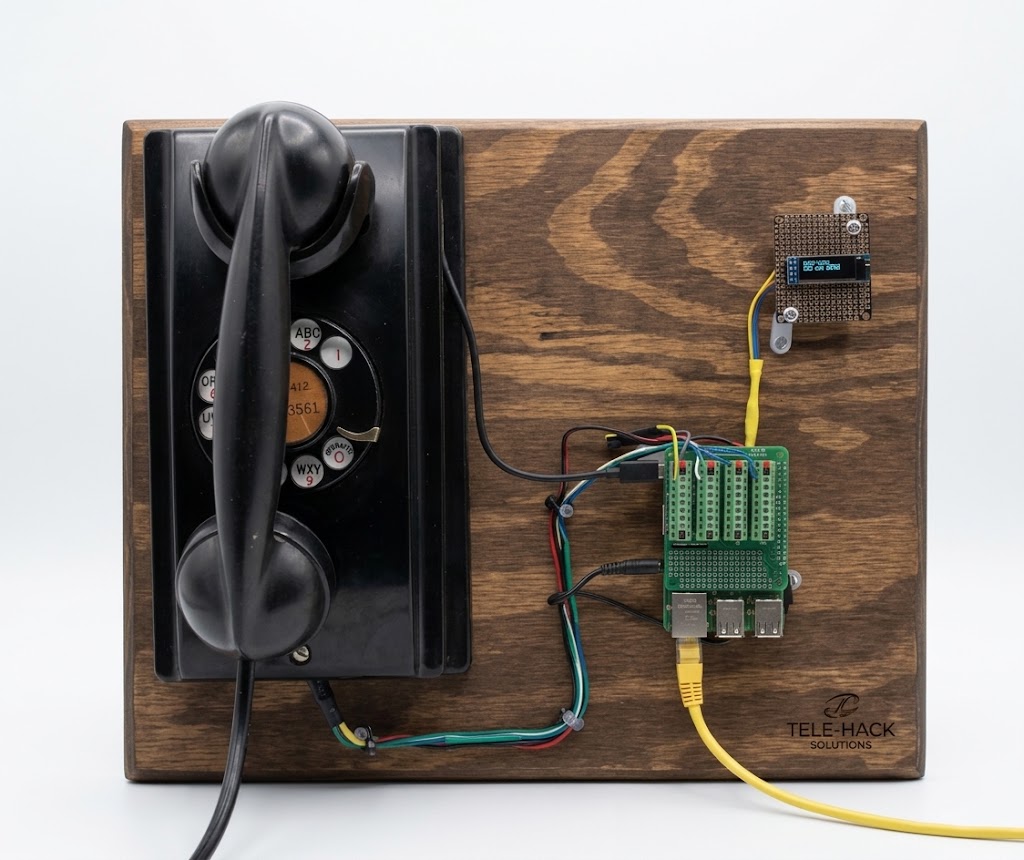 Rotary Pi — a vintage rotary wall phone rebuilt with a Raspberry Pi and OLED display
